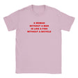 A WOMAN WITHOUT A MAN IS LIKE A FISH WITHOUT A BICYCLE - BABY TEE – Light Pink